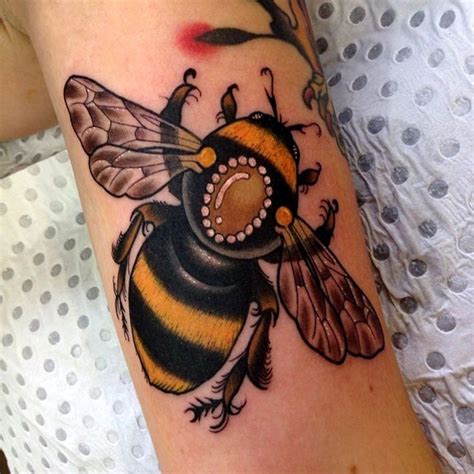 Beautiful realistic bumblebee tattoo on arm - Tattoos Book - 65.000 ...