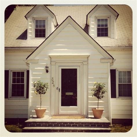 Showit Blog - | White storm door, Exterior house color, Black doors