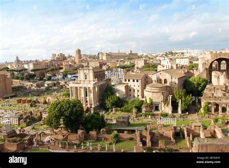 Aerial panoramic cityscape view of the Roman Forum during sunset in ...