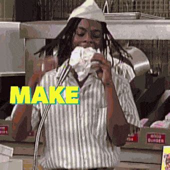 a woman with dreadlocks eating food in front of a microwave and the words make over her face