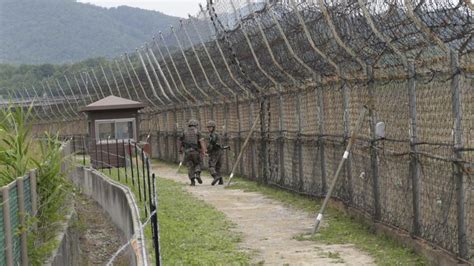 North Korean man crosses armed border | 7NEWS.com.au