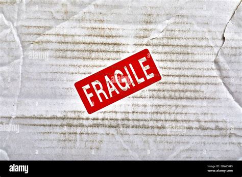 Fragile stamp closeup Stock Photo - Alamy