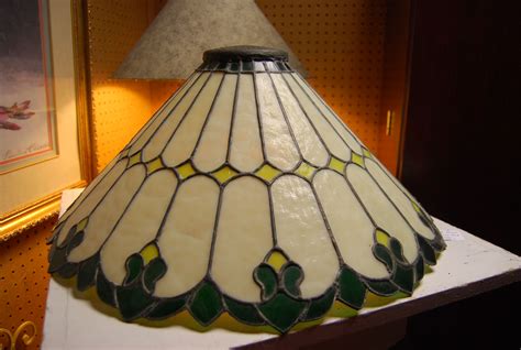 Antique stained glass lamp shade, very heavy. Can be seen at Gillespie Gardens on Facebook ...