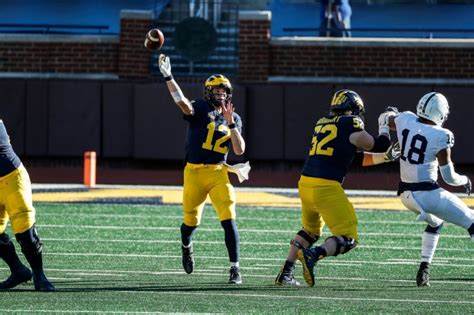 Cade McNamara, Michigan Wolverines tackle high-scoring neighbors