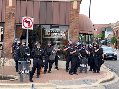 Protesters Throng Downtown Naperville As Businesses Board Up ...