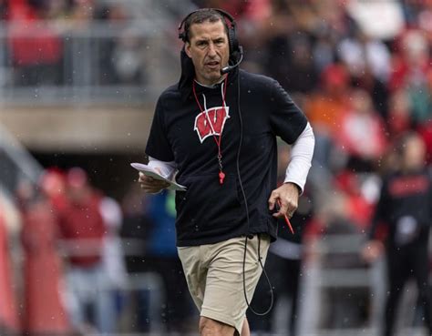 Wisconsin Badgers head coach Luke Fickell talks to reporters after practice