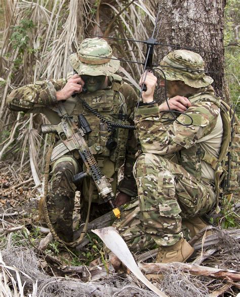 Australian Army Special Forces soldiers from the 1st Commando Regiment establish radio ...