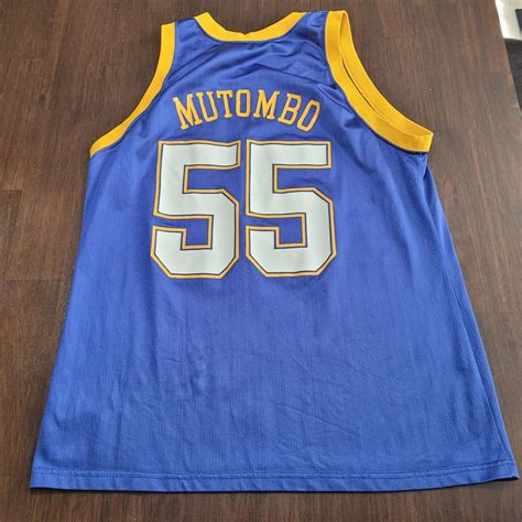 Champion Dikembe Mutombo jersey. Size 48. Pit to... - Depop