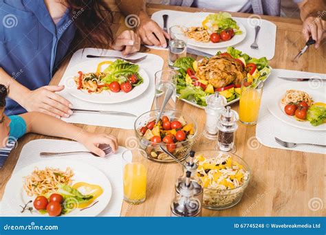 High Angle View of Family with Food on Dining Table Stock Photo - Image of healthy, lifestyle ...