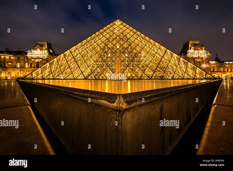 Louvre pyramid interior hi-res stock photography and images - Alamy