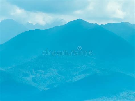 Blue Mountain Crests with Mist Landscape Stock Photo - Image of ...