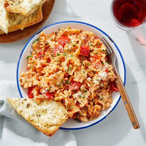 Recipe: Mafalda Pasta in Creamy Tomato Sauce with Cheesy Bread - Blue Apron