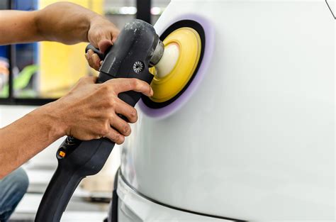 Polishing a white car 1923279 Stock Photo at Vecteezy