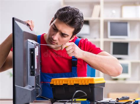 The Professional Repair Engineer Repairing Broken Tv Stock Photo ...