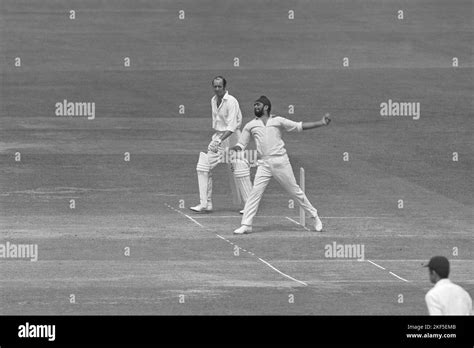 Bishan Bedi of India bowling Stock Photo - Alamy