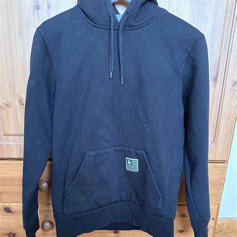 CARHARTT LOGO HOODIE CONDITION 8/10 SLIGHTLY FADED... - Depop