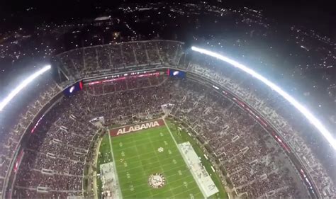 See What it Looks Like to Skydive Into Bryant-Denny Stadium at Night