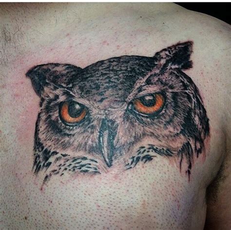 Realistic owl head tattoo. Orange eyes. Great horned owl tattoo. Black and grey shade. Owl ...