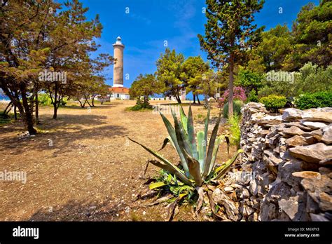 Veli Rat lighthouse in green Mediterranean landscape, Dugi Otok island ...