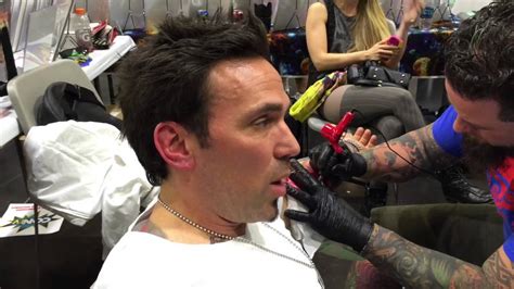 Jason David Frank gets tattooed in the GeeksterInk Legends booth. - YouTube