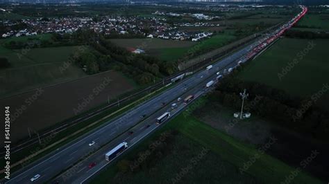 Dense traffic and traffic jam on a highway at dusk - aerial view Stock ...