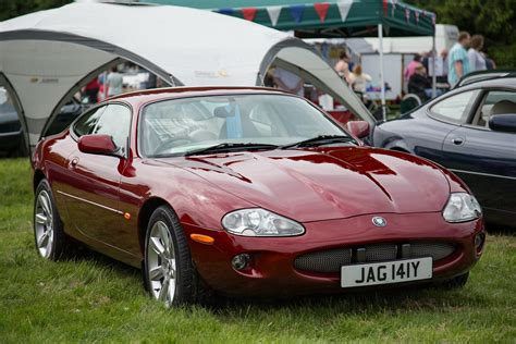 Jaguar XK8 | Red Jaguar XK8 - JAG 141Y - seen at the 42nd Sc… | Flickr