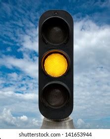 Yellow Traffic Lights Against Blue Sky Stock Photo 141653944 | Shutterstock
