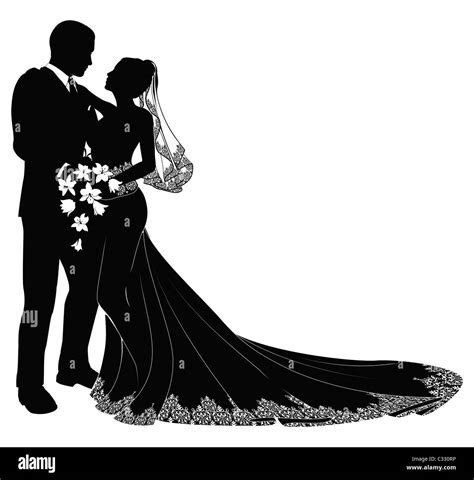 A bride and groom on their wedding day about to kiss in silhouette Stock Photo - Alamy