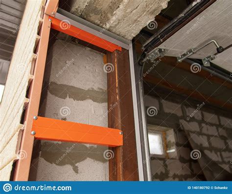 Installation of the Gate in the Garage Metal Stock Photo - Image of ...