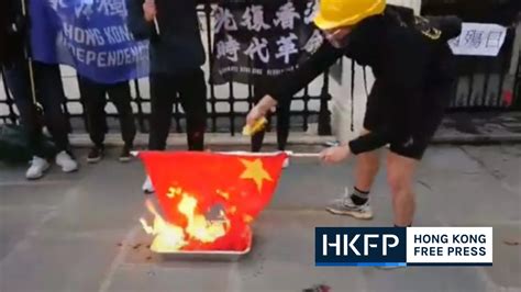 In Pictures: Ambassador demands UK take action after protesters chant slogans, burn Chinese flag ...