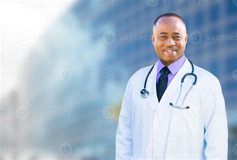 African American Male Doctor Outside of Hospital Building 16356974 ...