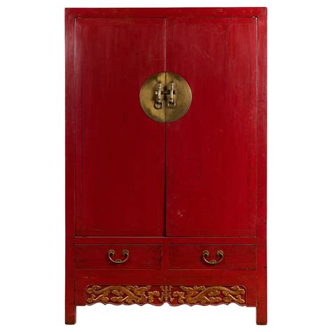 Qing Dynasty 19th Century Chinese Hand Carved Armoire with Gilt Painted Panels For Sale at 1stDibs