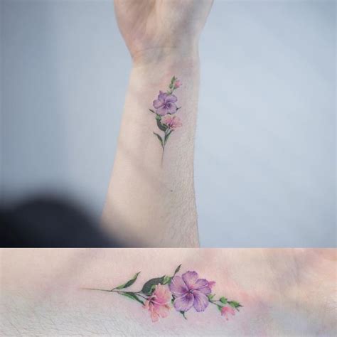 Watercolor tattoo - Sol Art on Instagram: “Single line flower tattoo . .…” - TattooViral.com ...