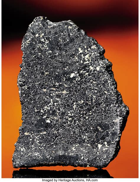 THE RAREST OF ALL METEORITES FROM MARS - A CHASSIGNITE. ... | Lot #41240 | Heritage Auctions