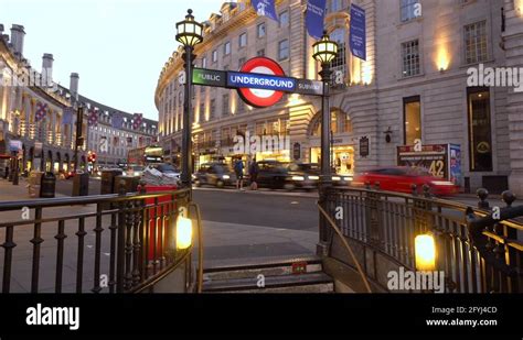 Oxford Street in London, Tube Station Entrance Stairs and Traffic Time ...