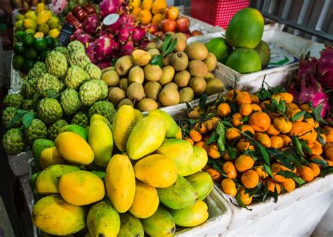 Exotic Fruits in the Asian Market Stock Photo - Image of mangos, food: 64104906