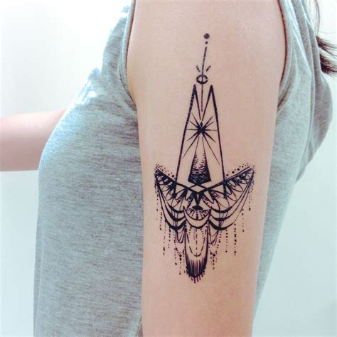 Tribal Bohemian Wing Tattoo | Bohemian tattoo, Trendy tattoos, Neck tattoo