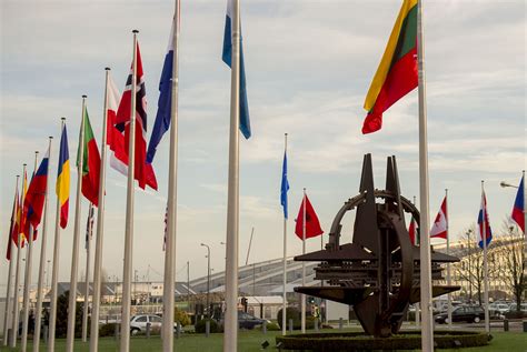 160211-D-DT527-007 | NATO country flags wave at the entrance… | Flickr