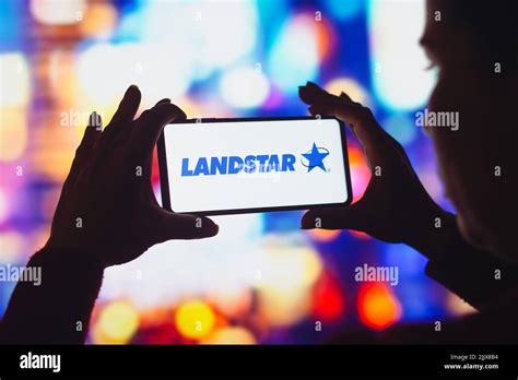 In this photo illustration, the Landstar System logo is displayed on a ...