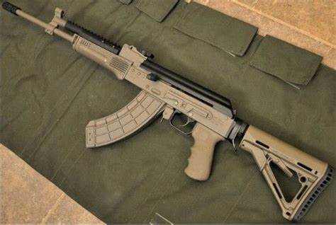 Ak 47 with venom tactical front gas block sight and ultimak rail and magpul m4 stock. Ak 47 ...