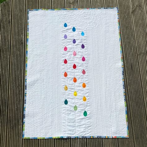 Rainbow Raindrops Baby Quilt | FaveQuilts.com