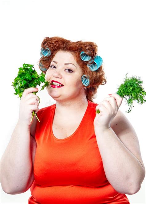 Fat Woman With Sensuality Red Lipstick In Curlers On A Diet Holding Parsley And Dill Stock Image ...