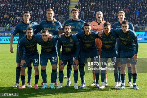 The Frosinone Calcio team is lining up for a team photograph during ...