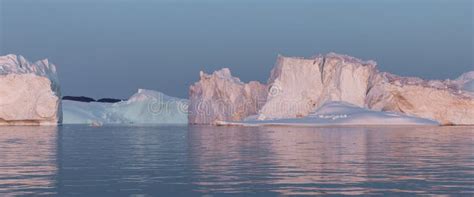 Floating Icebergs in Disko Bay during the Midnight Sun Stock Photo - Image of beautiful ...