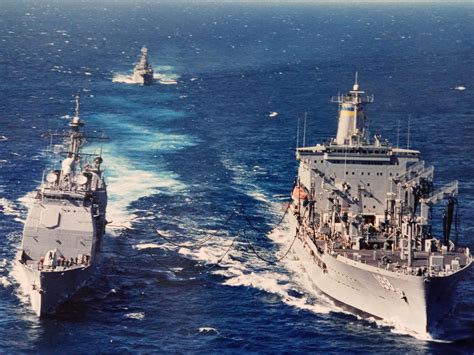 USS San Jacinto(I think) and USNS Big Horn undergoing unrep somewhere ...