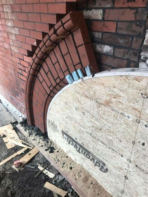 Brick arch install | Brick archway, Brick arch, Brick architecture