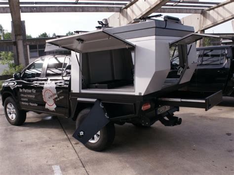 This pop-up camper transforms any truck into a tiny mobile home in seconds