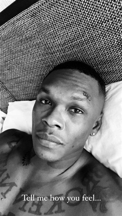 Israel Adesanya's new face and neck tattoos explained - Pulse Sports Nigeria