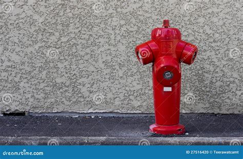 Fire Hydrant On The Wall Stock Photo - Image: 27516420