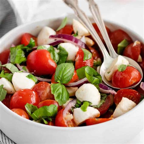 Tomato Mozzarella Salad (with fresh basil!) - The Cheese Knees